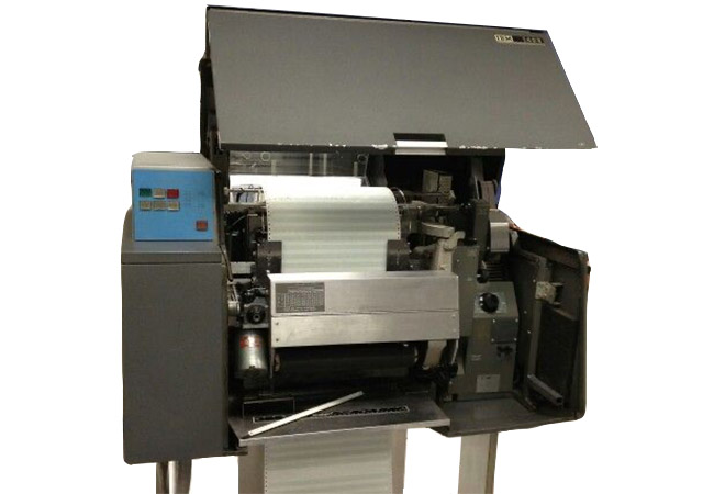photograph of a line printer with its cover pulled up